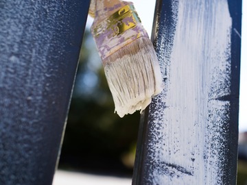 whitewashing a fence