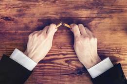 hands snapping pencil photo