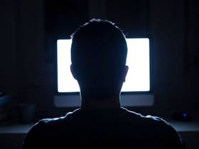 edgelord-slang-definition-man-at-computer-photo