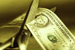 cutting-a-dollar-photo